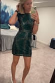 Absolutely loved this dress. Wore it for a night out in Vegas and received many compliments. The arm area was a little tight but not annoyingly. I typically wear a small and glad I didn't size up. - Samantha V.