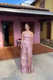 This dress is SO beautiful. I bought it for a formal wedding and it was definitely show stopper. My only caution is that it is EXTREMELY long. Only buy it if you have enough time to get it tailored. But the extra effort to get it tailored was well worth it! I would give it a 5 stars if not for the length, but regardless you will not regret it - Gabriela C.