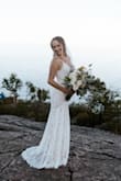 I'm a very petite individual, the dress is a little long but otherwise fits PERFECTLY. I ordered an XXS. I had the bottom hemmed cuz it was a little too long. HIGHLY recommend. - Dana S.