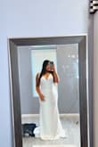 I'm doing a small ceremony and I didn't want to spend much on anything! I purchased the dress and was hoping it'll fit.. and it sure did! Amazing it has some stretch to it as well. definitely happy with my purchase and can't wait for my wedding day.
I tried it on but I couldn't zip it up bc I couldn't reach otherwise it's amazing lol - Destiny P.