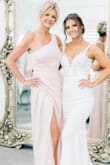 My daughters picked this out, I was worried it was too young for me. But I loved it. 
(Mother of the Bride dress.) Late April Wedding. 
Soft thin fabric flowed nicely and did have the slit stitched so it wouldn't open up too much. Comfortable and didn't need a slip. - Karen G.