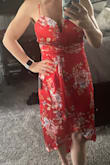 This dress surprised me as I didn't realize how low the V is in the front. I was able to wear a bra that didn't show. The fit is spot on. I am a 4 and chose the small.
I'm 5'2" and the length was just right for a conservative kids party.  The material doesn't have much give. It's very comfortable but keep that in mind with sizing. - Laura W.