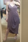 It's a beautiful, formal, romantic dress. It ran a little large and made my bust seem a lot smaller (I was wearing an adhesive cup bra). Love the color and the style but it didn't quite do it for me, I did not end up wearing it, and think I will return it. If I wore dresses more often I would keep it because it truly is a beautiful piece, but I simply do not need another dress that I feel pretty indifferent about being a sporadic dress-wearer. - Rose A.