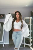This top is a show-stopper! Super comfy and dressy, wear a low-cut bra with it. I like how flowy the sleeves are and that it zips in the back. This is perfect for a girl's day at the winery or going out on a date! A must-purchase! - Mandi H.