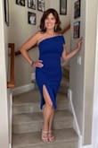 This dress was fabulous for a Friday night wedding! The blue was almost exactly like the picture, but even prettier. It fit like a glove due to the stretch, but was also flattering due to the fabric. The slit was perfect, not to high, and quite comfortable for walking and dancing. The only reason I am not giving it 5 stars is that shoulder piece and strapless part of the dress needs constant adjusting, even though it's not loose. If you are at an event with much dancing or movement, know that the shoulder piece will come up onto your shoulder, and you'll have to pull it down. But, overall it was fabulous, and I got many compliments and questions about where I found it. - Griffin N.