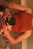 My normal size is a small and I probably needed a large in this. Even though the front mostly looked right, I felt like I was bulging out of the back which caused the material to bunch on the sides. I tried adjusting where the ties sat on my back (both low and high) and it didn't make a difference. Very disappointed. Decided to return instead of exchanging. - Marissa A.