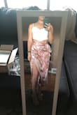 The skirt runs a little big but it's so cute I'm just going to make it work. The material is nice. - Marissa A.