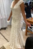 My family could not believe the price of this dress for the amazing quality! Fits true to size too! I only needed minor alterations. Definitely recommend it if you are on the fence about buying! - Sophie K.
