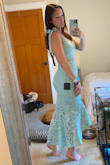 Absolutely love this dress! I have an hourglass shape with a larger bum so I definitely had to squeeze and stuff my hips and butt into the dress. It's right on the edge of being too tight. Due to this, it wanted to ride up my hips, but putting spandex shorts on underneath helped eliminate that problem. However, the torso fits perfectly so I think a size up would've been too loose there for me. Such a beautiful color and shape to the dress, I received so many compliments at the wedding I wore it to and was even called best dressed! - Bridget P.