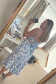 I ordered this dress for my engagement session! There were no reviews when I purchased it, and it said "this fabric has no stretch" I was a little nervous so I ordered a large and an XL just in case. I did not even try on the XL because the L fit perfectly! Slightly loose in the waist, but I would rather that than too right! The bow tie in the back is the cherry on top! You can make it tight enough so you don't need a bra, it has great support! It's very similar to a linen material, so it was a little wrinkly, but the Downy Wrinkle spray does wonders! Highly recommended! - Annie T.
