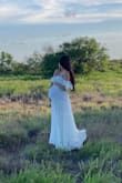Bought this dress for my maternity shoot. Absolutely stunning dress. You can dress it up or dress it down. I wore it with a boho hat and booties super cute. Going to wear it again for baby shower because it's too beautiful not to wear again - Karimi F.
