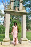 I wore this dress to my boyfriend's sister's wedding at Morais Vineyards & Winery. I love the fit and design of the dress. It gave me the perfect hourglass shape. My only complaint is that the bust area is a little small. It would be great if it was a tad bigger in that area, but other than that it's the perfect wedding guest dress. - Tatiana