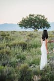I got this dress for my elopement and it looked great! I wore under 3 inch heels and no alterations were needed. The quality is very good. Many people thought that this dress was custom made for me. - Aigera M.