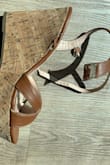 I loved these shoes but was so disappointed that that strap broke after not many uses. They were very flattering, versatile and comfortable. Please bring these back with better quality. - Dana A.
