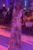 I can't say enough nice things about this dress! Great color & quality. I did not have it hemmed so I had to hold it up for walking/dancing but I didn't mind. Was stepped on a few times but never ripped. Nice and flowy with a perfect side slit. Wore it to an August wedding and got so many compliments!!! ( hard to zip, kind of tight around the ribs even though it was my size) wish I had another event to wear it to :-) - Adrienne P.