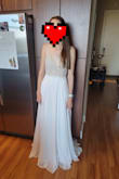 I ordered a few dresses to try on for a beach wedding from Lulus and this was one of my favorites! I decided to go with another dress because I like a more form fitted dress. I'd still highly recommend trying it! I would've had to get it hemmed and I found the top to be slightly itchy but double. - Kelli F.