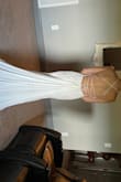 This was my "backup" dress, but I loved it so much, I kept it as THE dress. Sexy open back, light weight-ish (enough for summer), & extra long. Beautiful, quality fabric. I customized the train, so it looks slightly different than pictured. - Wanda C.