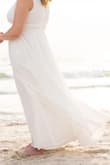 I bought this for my 20 year vow renewal on the beach. It was comfortable, beautiful and just what I wanted. I had it slightly altered at the shoulders and added cups but otherwise it was perfect. - Maura W.