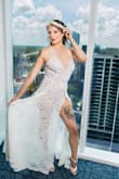 I absolutely loved this dress! It was perfect for our wedding where we went to the pride parade after. I felt like a princess without spending too much money. It runs a little large, so I highly recommend sizing down. I sized down and still have to get it altered. - Jacklynne H.