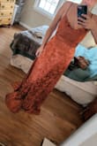 I had high hopes for this dress! The material is nice, I love the color, and the pattern is adorable. The top didn't fit anything like it shows in the photo, the fit is a little strange as well. It could probably be altered to help with these issues but not worth it in my opinion! I tried to tighten the straps to pull the top of the dress up but the adjustment pieces were all the way by my armpits by the time I tightened it enough. - Rachel C.