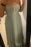 I ordered up a size to be safe and it fits perfectly. Color is a light/seafoam green. - Lea B.