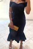 This is a beautiful dress. It stretches but is thick and well made. It was perfect for the wedding I wore it to. Tons of compliments. I couldve maybe sized down but then dont know how the top wouldve fit me. The medium I originally ordered was baggy on me in the stomach and hips/butt. The small looked much better and they were quick to send the new one out. Great customer service. This is definitely a keeper! - Amy L.
