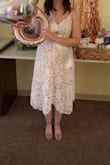 This dress is so pretty! It fits pretty true to size, maybe size down if you're between sizes. The straps are adjustable and it seems to be nice quality. Would definitely buy again! - Sarah W.