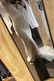 I love it. I was shocked at how much I loved it.I'm not usually drawn to sleeves like that but I just loved everything about the dress. I felt it was a little tight so I sent it back and will be ordering a small. It's so beautiful I can't stop thinking about it. - Betty J.