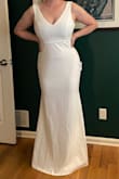This dress fits very well and gives you a great shape from every angle! I think it would be best for people with smaller busts since the back is open and there is minimal support but it's fine if you use tape. It has non-slip grip on the shoulder straps so they don't fall down, which is a nice touch. The length is great with heels. I don't love that you can see the seams in the chest/back area but it's not a deal breaker. The material is super stretchy and easy to move in, not too heavy, but definitely thick so it keeps you warm. I was worried about being cold in a sleeveless dress but it works great! - Christine R.