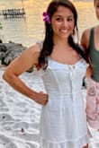 The dress fits great and has some flare to it. I am not one to look good in ruffles, but this dress had the right amount of detail in the right places! - Katelyn K.