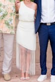 I bought this to change into after our wedding ceremony. I returned the Medium (too big) and got a Small that fit perfectly. The dress is gorgeous, but the sleeve looked a little cheap. I took it to my tailor and they removed the sleeve for me (only cost ~$30). WOW what a difference it made!! Made it better as a summer dress. Everyone loved the dress and I will definitely wear it again. - Shawn P.