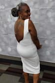 I'm short so the dress length was long but it made it just that much more sexy! (the dress is really well made with a liner) Lots of compliments! - Tracey B.