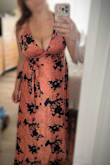 Absolutely love this dress. The fabric is lusciously soft and the dress is surprisingly comfortable and flattering. Usually, my belly bulge makes flowy dresses look like maternity wear, but this dress did a better job of concealing me than I expected it would! Unfortunately, I'm not comfortable flaunting this much cleavage, at least not around my family. I would consider keeping it for a different occasion, but I'm unsure about the size. Currently, all sizes are out of stock, but I'd love to try one size down (Large)... the XL feels loose everywhere, so I'm wondering if a smaller fit would feel more "supportive". Too busty for the wedding I purchased it for, but potentially great for a different occasion :) - So L.