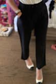 Bought these to add to my office wardrobe and was not disappointed. The cropped look fit my body well without making them look like they were too small. I returned another pair of Lulus dress pants because the quality was just too cheap looking but I kept these because I was fine with the feel. Would buy again! - Anna G.