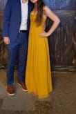 This dress was gorgeous! I got so many compliments. The bust was a little loose so I had to put some double-sided tape on my stick-on bra. The slit up the side is also not very noticeable but that didn't bother me. It was a little long but I wore heels so I didn't get it altered. - Denzie H.