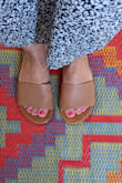 These are great.. I'm not sure how well they would hold up for everyday use but I got them to wear at a wedding before/after putting on my heels and they have a nice polished look. I even wore them to the pool once and got them wet and the water dried without leaving a mark. I've had no issues with the leather creasing as other reviews mentioned. Highly recommend to anyone looking for a dressed-up sandal. - Faith E.