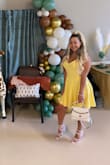 Amazing material and the best color yellow. A little loose in the waist area but I wouldn't change the size especially because of the length. I felt prettier than Barbie! - Gabriella - Gabriella W.