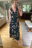 This dress is super feminine and sits beautifully on the waistline. I love the back ties too. I have it in two colors! - Tara M.