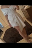 This is such a cute style. It is a little short, so be aware of that. I'm right in between sizes so based on other reviews, sized up to a M which is way too big. Had to exchange for an S, which was perfect. More of a cream/off-white color, which is what I was going for. Planning to wear it as a reception dress at my wedding. - Krystle T.