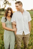 I got this dress for our engagement photos. I originally ordered a small, and it was way too big in the waist & chest. I returned it for an XS, and this fit much better. The dress is very soft and comfy and was a great length so I didn't have to get it hemmed! - Mikayla S.
