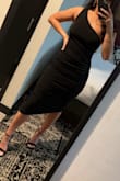 I love this dress. I first bought it in black and it was perfect. Fits true to size. Didn't have to wear a bra with black but needed to with white. - Nicole D.