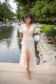 I love this dress so much I have it in two colors!! I used this dress for family pictures, but I have the pink one too and it's a great wedding guest dress. The fit is perfect and so flattering. Definitely would suggest buying it!!! - Sienna M.