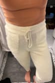 I like the pants a lot but you can see anything dark through the material. If they came in another color it might not be so noticeable. They do stretch after you wear them for a couple of hours so you might want to size down. Positives are that they're e comfortable and very soft. I would buy again! - Keri O.