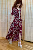 Runs small as I'm usually XXS. 
Love the flow high low. I actually chose the burgundy over black and wrote a longer review but here I was able to upload photos. Just walk around and strut the flow! - Rachel M.
