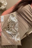 This is beautiful. I love that it's neutral, so it can be worn with most outfits. I was pleasantly surprised that it had a long strap, as it's more conveniently worn as crossbody - Shannon R.