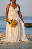 It was so beautiful. I used it for my vow renewal on the beach. I loved the slit and how the back looked. I did need help to get into the dress and figure out how the straps go. The bust area was a little loose and I would have gotten it taken in at the top if I had extra time but I used safety pins to hold everything in. Definitely a great buy! - Laura A.