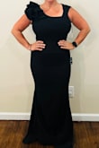 The dress is absolutely stunning and fits like a glove. The material is of good quality and has a beautiful stretch to it. The dress is sure to hug your body in all the right places! The dress is even more beautiful in person! Would highly recommend this dress to everyone! A must-have for a great price! This is a medium. - Joy C.