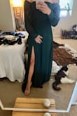 This dress is beautiful. I love the sleeves. I am very short so I will have to get it hemmed. Other than that it fits perfectly. - Madison W.