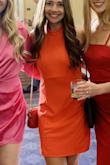 The dress was cute and got comments all night long! I would say it ran large in the armpit area so I had to hem that area to make it tighter. I went up a size because it looked short and glad I did even though I had to alter another area of the dress. - Kaitlyn A.