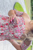 Absolutely love this dress. Beautiful coloring, and lightweight material. Great for a shower or a trip to a winery, but also could be worn more casually. Very flattering and forgiving.

(Sorry my photo is cropped so weird, wouldn't let me do it any other way!) - Kaitlin W.